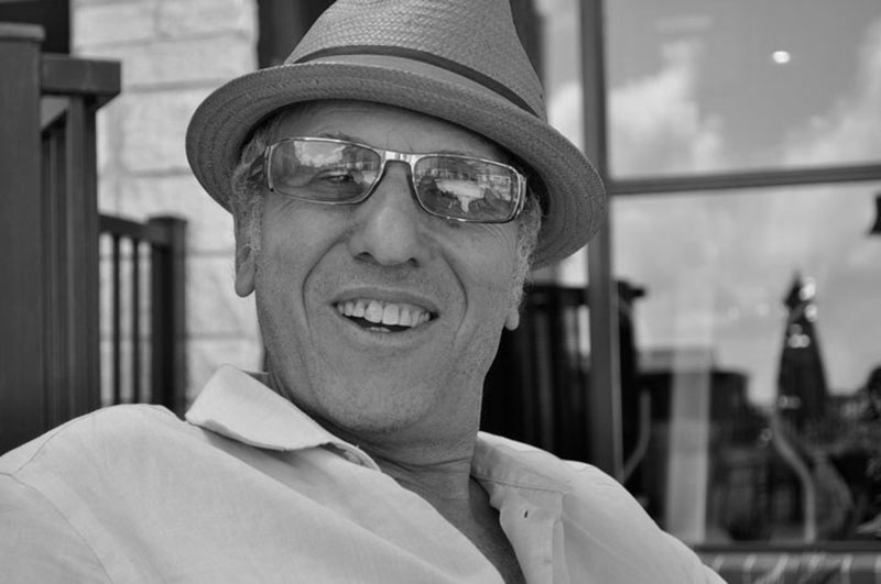 Larry Schultz profile in black and white